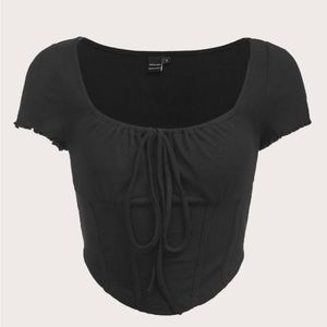 Tie front scoop neck curved hem tee